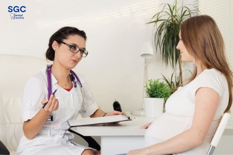 Khi mang thai mẹ bầu cần tham khảo ý kiến bác sĩ trước khi bọc sứ